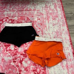 2 champions shorts 1 size small 1 size x-small both fit around the same